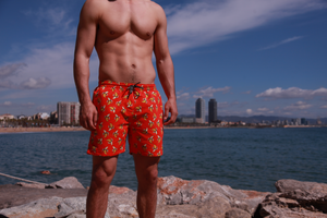 Pantaloneta de baño roja para hombre con diseño de bananas