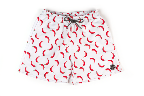 Pantaloneta de baño roja para niño con diseño de barcos de papel